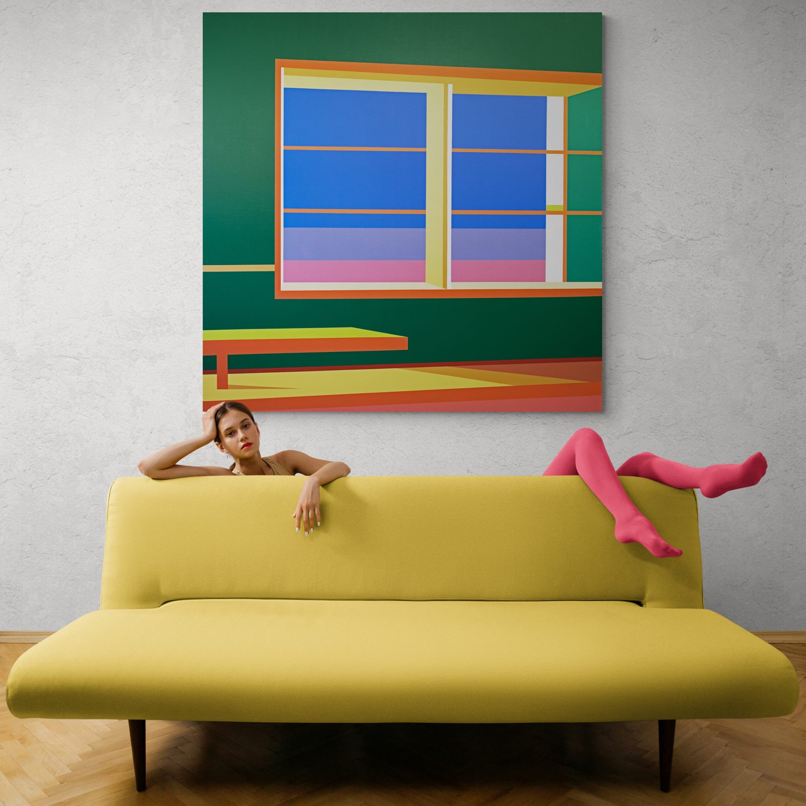 Young_woman_with_long_legs_behind_sofa-1-scaled
